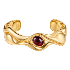 Gylden b�lgearmring med bordeauxfarvet cabochon