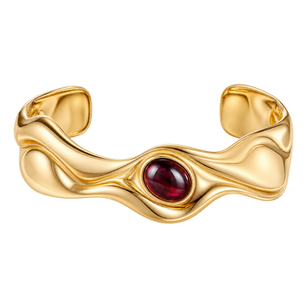 Gylden b�lgearmring med bordeauxfarvet cabochon